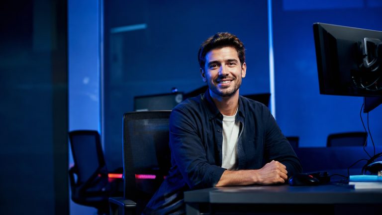 Male data science student working in a modern computer lab environment at Deakin University