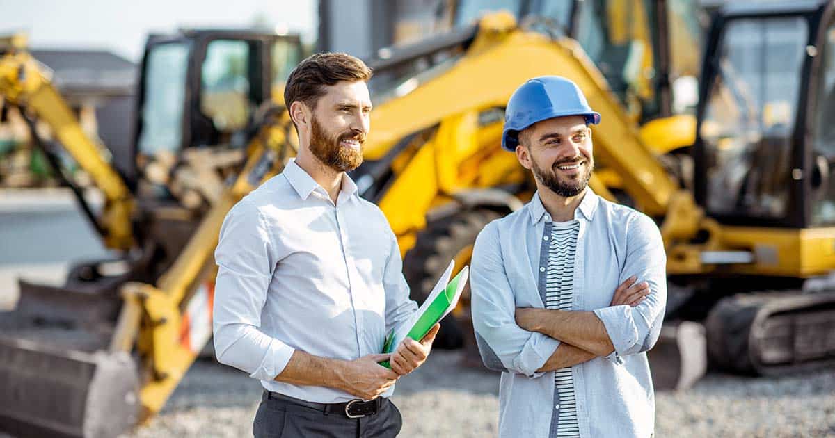 White collar workers meeting on a construction site