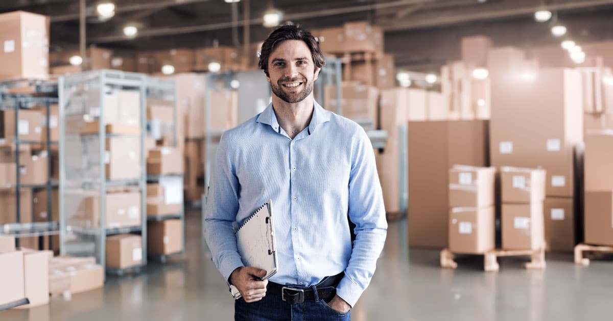Business professional in warehouse distribution centre