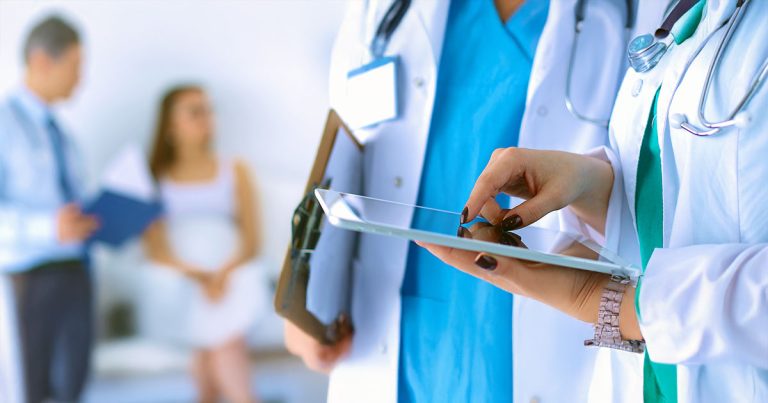 Discussions between people in hospital uniforms