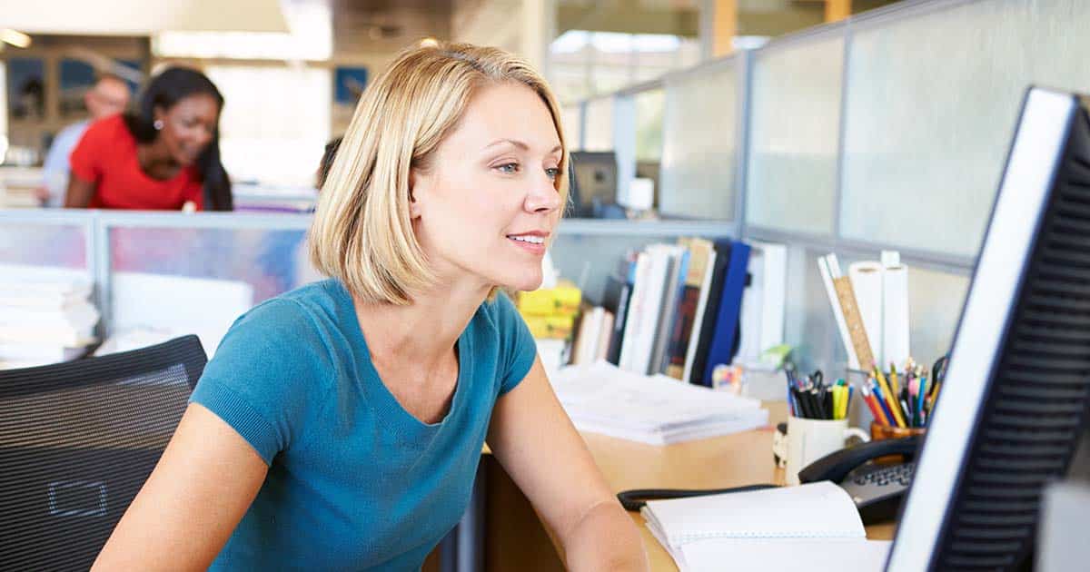 Woman using computer at work