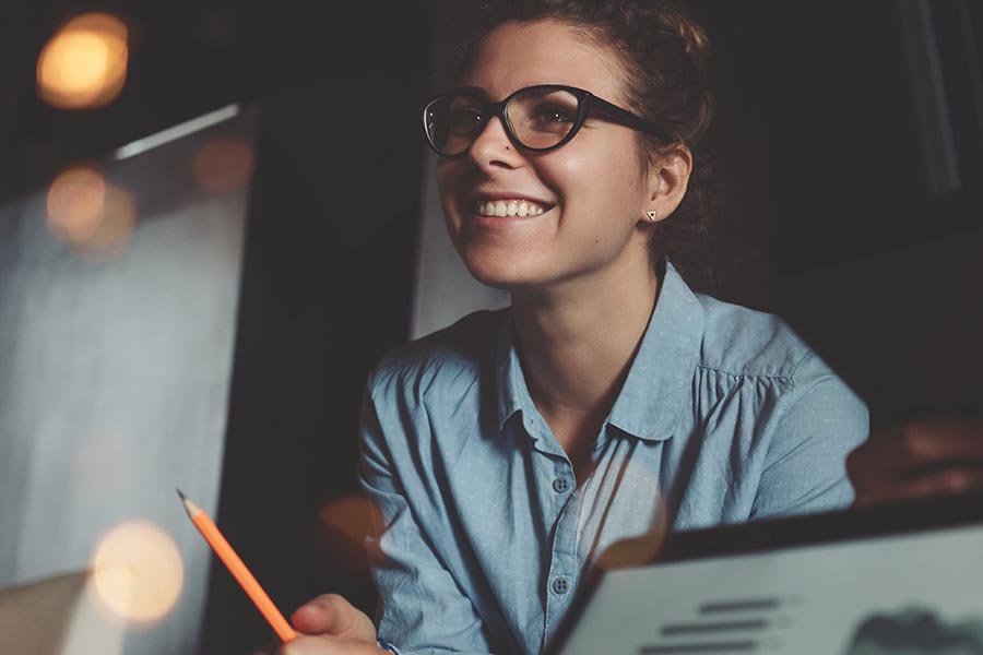 Young woman smiling in office environment