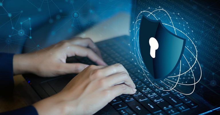 Man typing at computer with security lock symbol showing
