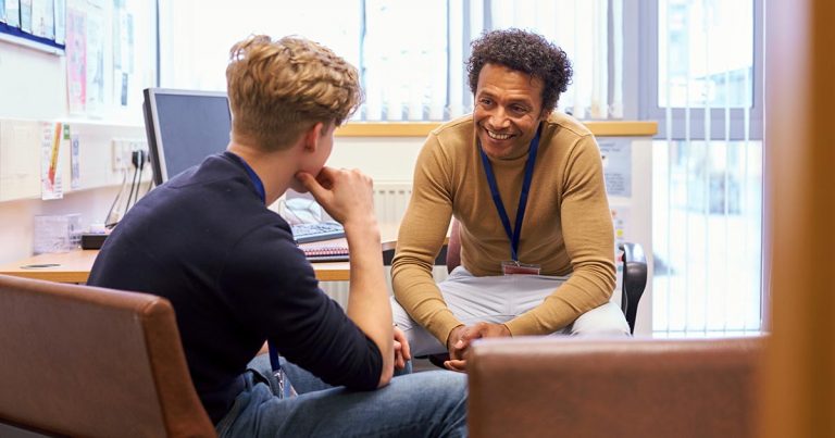 Consultation between professional man and an adolescent or young man