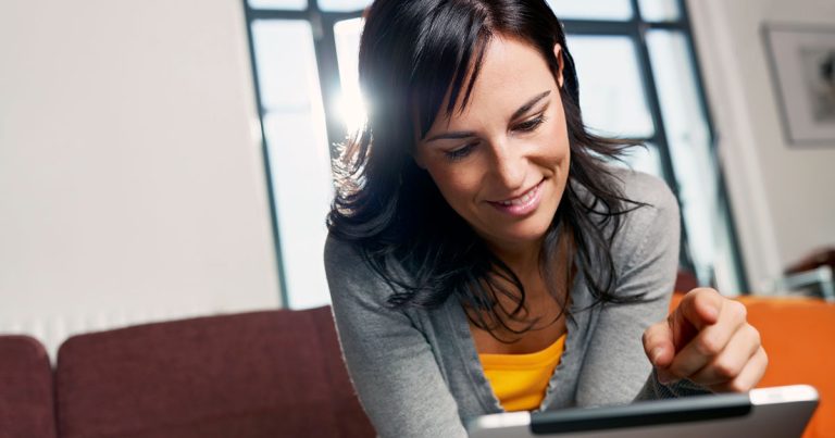 Online business diploma student with tablet