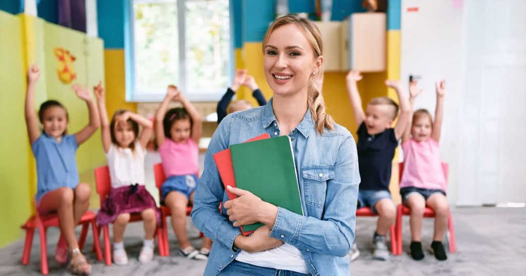 Primary school teacher with pupils