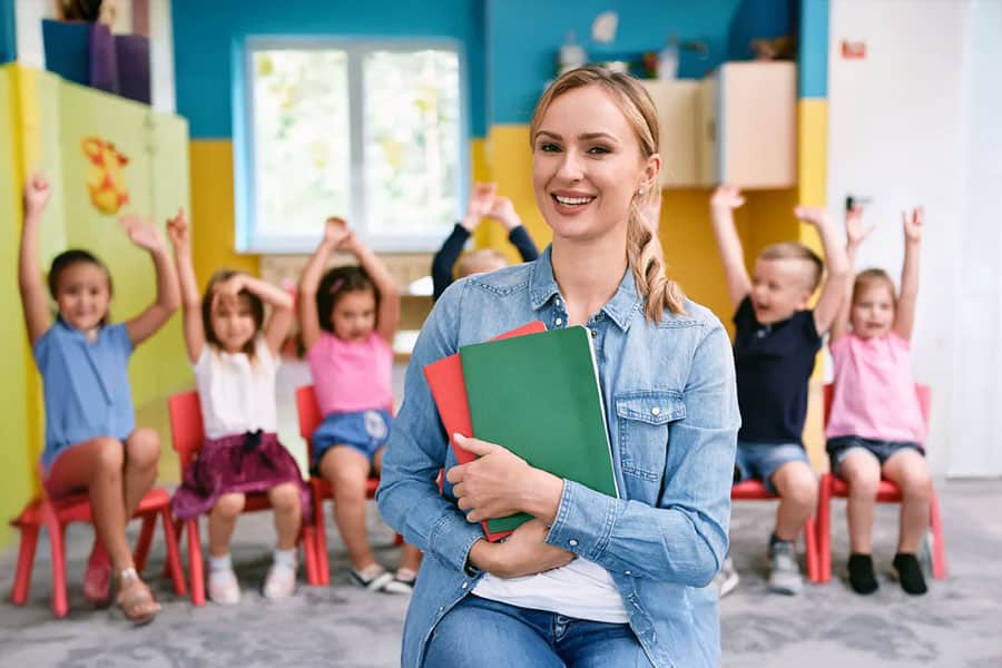 Primary school teacher with pupils