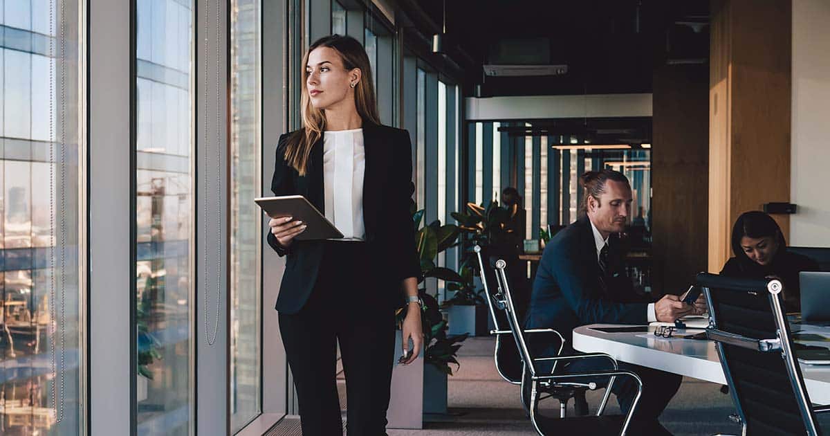 Professional woman strides through office