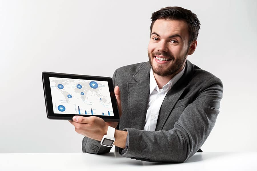 Business man studying online and showing tablet