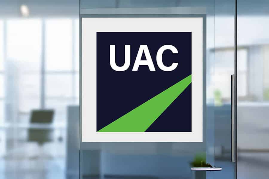 UAC sign on glass door