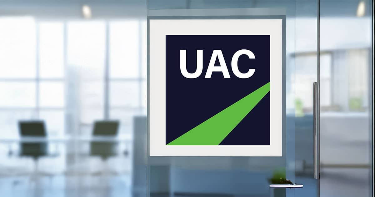 UAC sign on glass door