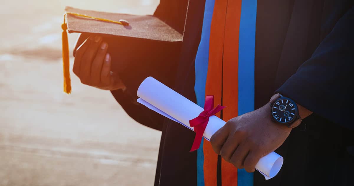 University graduate holds a degree certificate