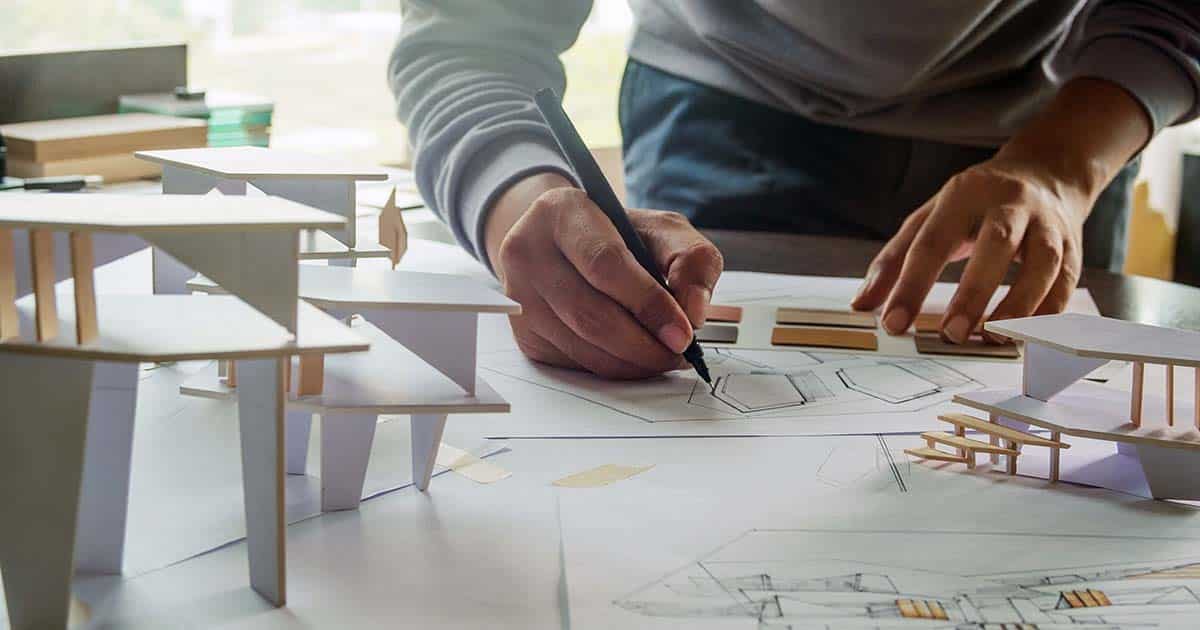 Designer drawings and scale models of building concepts