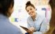 Woman smiling during consultative meeting