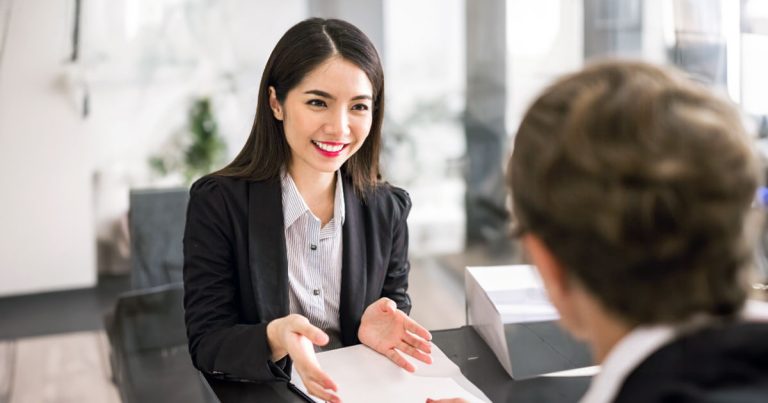 Young professional woman meeting with gentleman