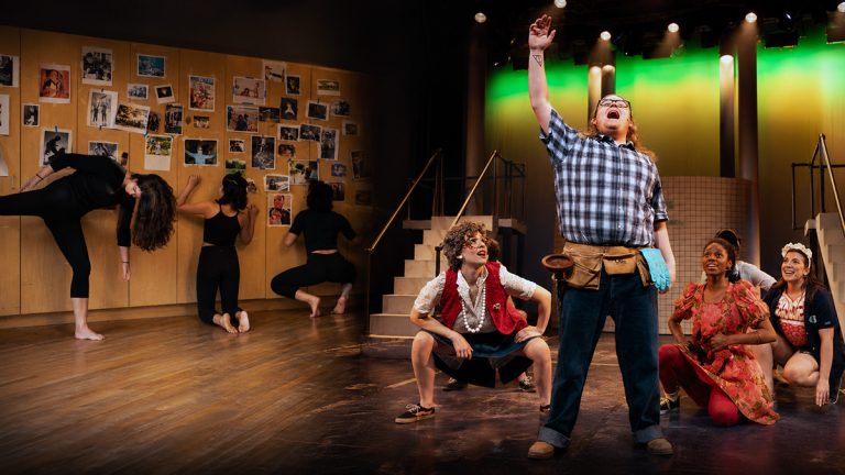 Theatre students move from rehearsal work to a staged performance under bright theatre lights.