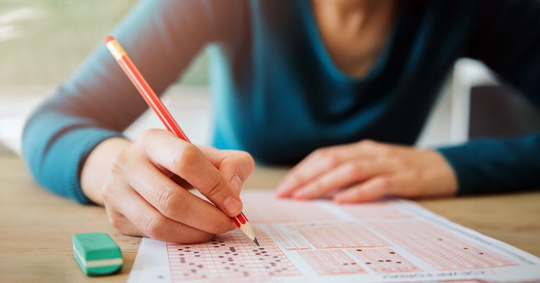 Female student completing standardized test