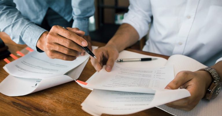 Researchers comparing notes